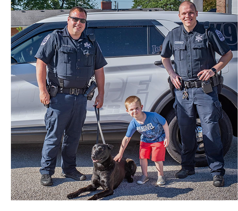 Ride Along Photo with Child and Dog